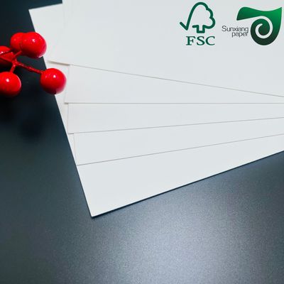 FSC 300gsm 15gsm Glossy PE Coated White Paperboard Food Grade For Frozen Product Packaging