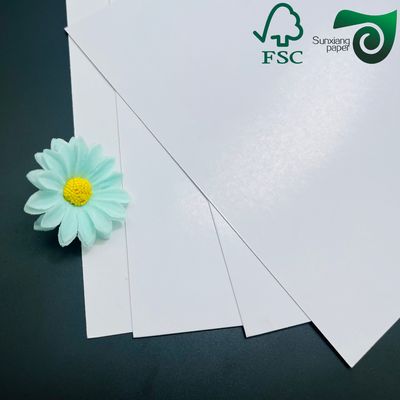 FSC  SGS Certified Double Sided Coating  C2S 300GSM White Glossy Art Paper Reel 100% Natural Pulp